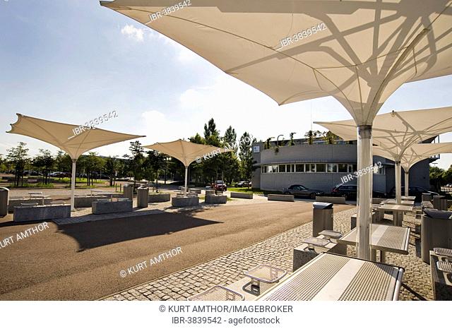 Seating and umbrellas in front of the Central Institute of Medical Engineering TUM, site of the Ludwig Maximilian University of Munich, LMU Garching Campus