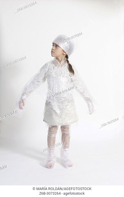 little girl wearing bubble wrap