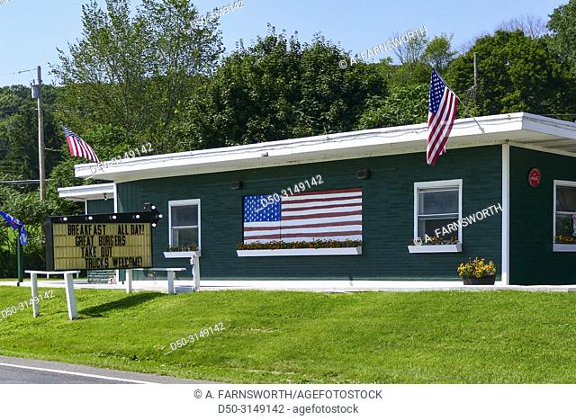Millerton, New York USA A traditional American diner with American flags outside on Rte 22