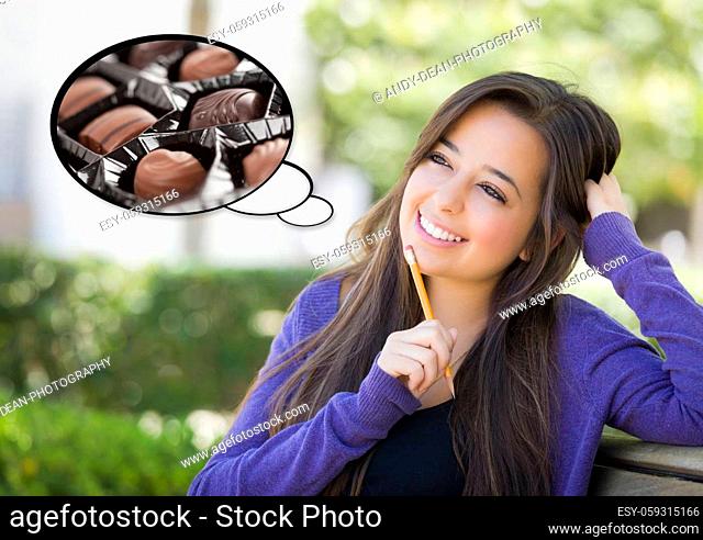 Pensive Woman with Delicious Chocolate Candy Inside Thought Bubble