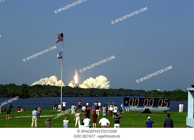 08/10/2001 -- Spectators gather on the grounds in front of the bleachers at the turn basin to watch the launch of Space Shuttle Discovery