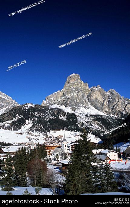 View on Corvara and mountain Sassongher in winter, Corvara, Alta Badia, Dolomites, South Tyrol, Italy, View on Corvara and mountain Sassongher in winter