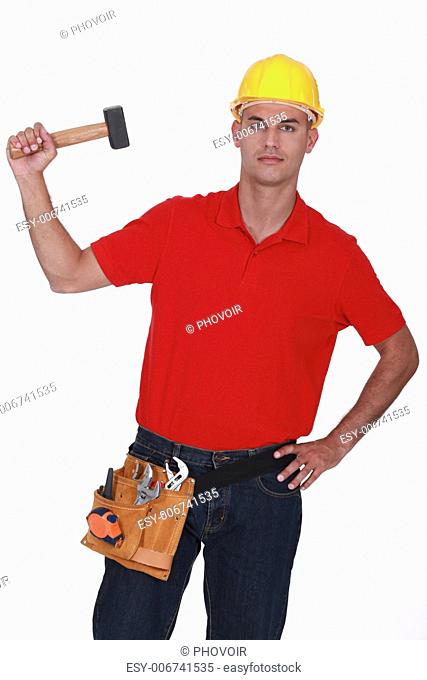 Construction worker with a mallet