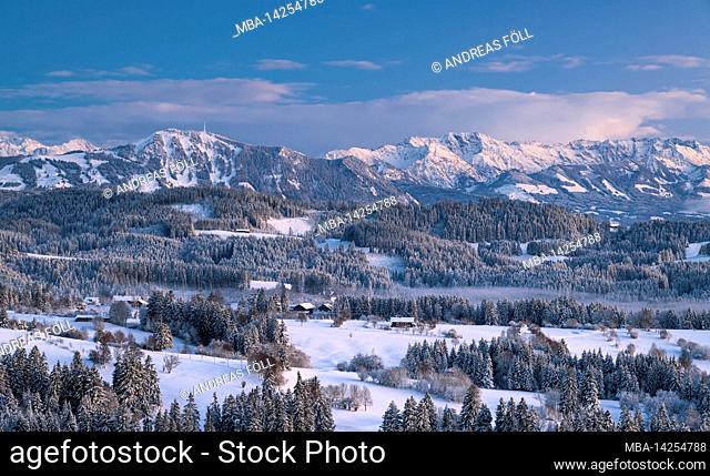 Snowy winter landscape in the Allgäu Alps after sunset. View to Grünten, Großer Daumen and Nebelhorn. Bavaria, Germany, Europe
