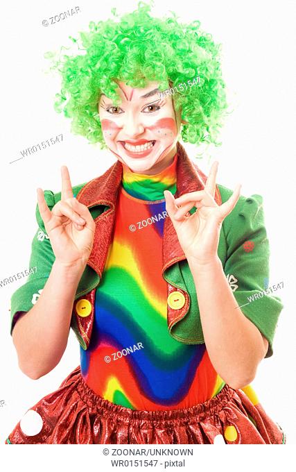 Happy female clown. Isolated on white background