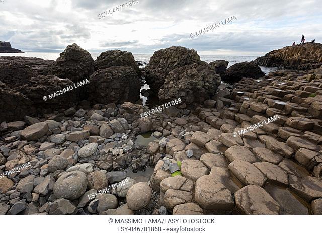The Giant's Causeway is an area of about 40, 000 interlocking basalt columns, the result of an ancient volcanic eruption