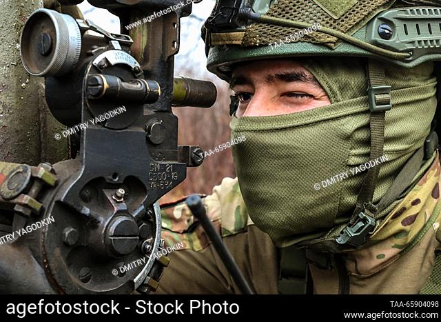 RUSSIA - DECEMBER 19, 2023: A member of a Grad multiple rocket launcher crew is seen while performing a combat mission on the Donetsk direction of Russia's...