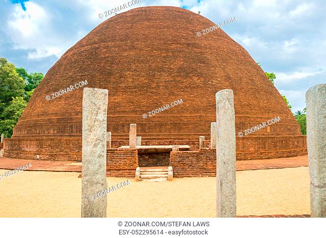 The old hemispherical dome, the Sandagiri Stupa, the oldest Stupa in the southern region, in small town Tissamaharama. The building is from Kingdom of Ruhuna as...
