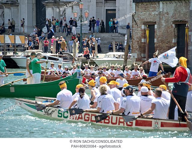 Rowers from many countries participate in the 42nd Vogalonga regatta on the Grand Canal near the the Basilica della Salute in Venice, Italy on Sunday, May 15