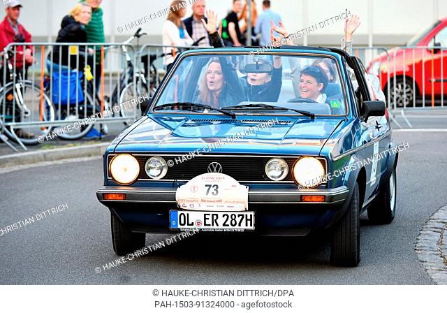Participants start with a vintage car of type VW Golf I Cabrio at the City Grand Prix in Oldenburg (Germany), 26 May 2017. | usage worldwide