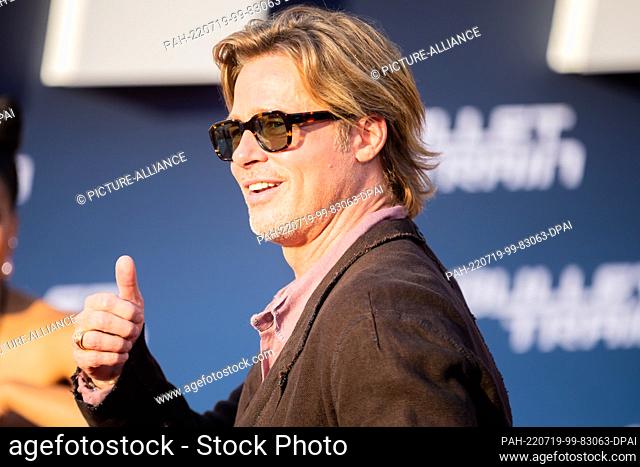 19 July 2022, Berlin: Brad Pitt, actor, gives a thumbs up as he arrives at the German premiere of the feature film ""Bullet Train"" at the Zoopalast