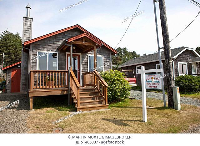 House for sale in the town of Cannon Beach with its typical wooden houses at Cannon Beach, Clatsop County, Oregon, USA