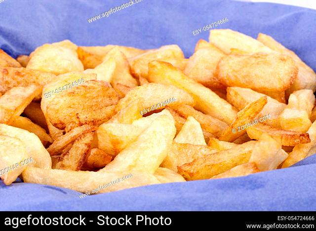 Close up view of a bunch of fried potatoes in slices