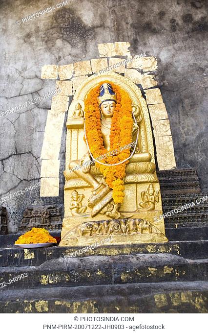 Statue of Buddha in a temple, Mahabodhi Temple, Bodhgaya, Gaya, Bihar, India