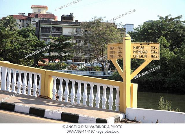 Road sign at the beginning of the Pato Bridge on the Creek near Mandovi River, Panji , Goa , India