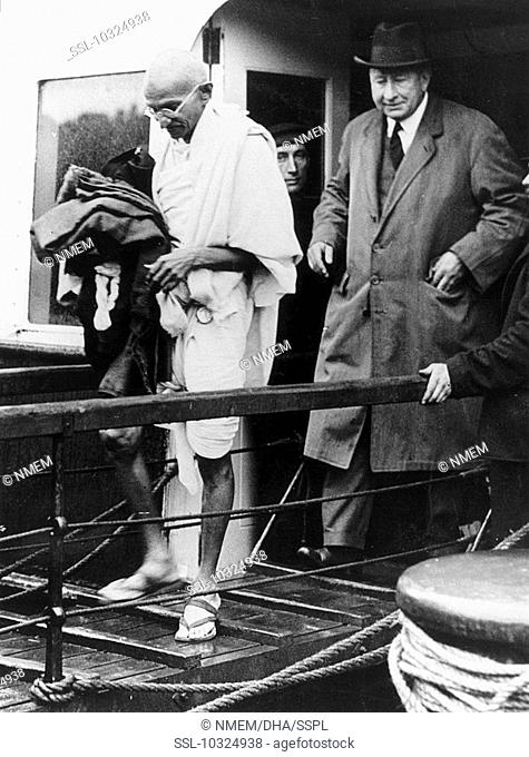 Gandhi alighting from a ferry  Gandhi 1869-1948 is remembered for his civil disobedience policy against British rule in India and his belief in non-violent...
