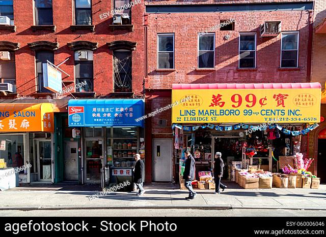 New York, United States of America - November 11, 2016: People in front of stores in Chinatown district in Lower Manhattan