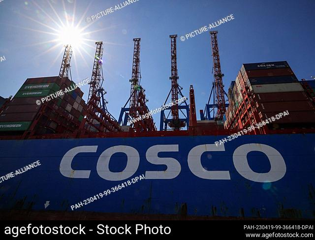 PRODUCTION - 17 April 2023, Hamburg: The container ship ""CSCL Pacific Ocean"" is moored at the Tollerort terminal of Hamburger Hafen und Logistik AG (HHLA)