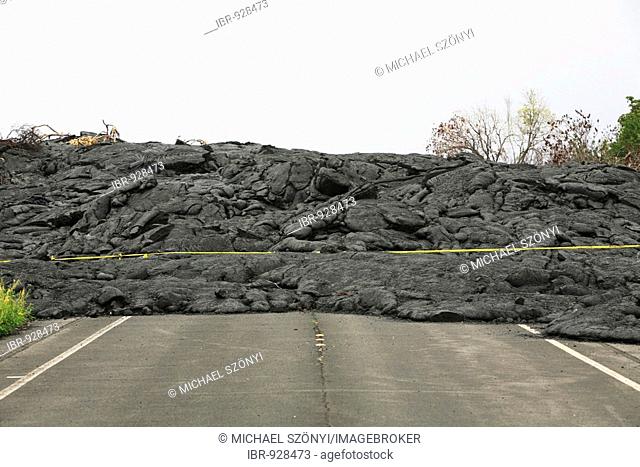 Destroyed road near Kalapena due to lava flow in the Eastern Rift Zone of Kilauea Volcano, Big Island, Hawai'i, Hawaii, USA
