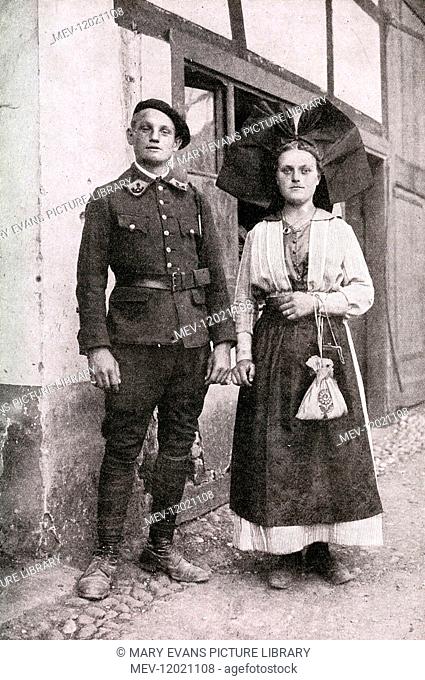 Soldier reunited with his fiancée after the First World War, Alsace, France. He is wearing the uniform of the Chasseurs Alpins