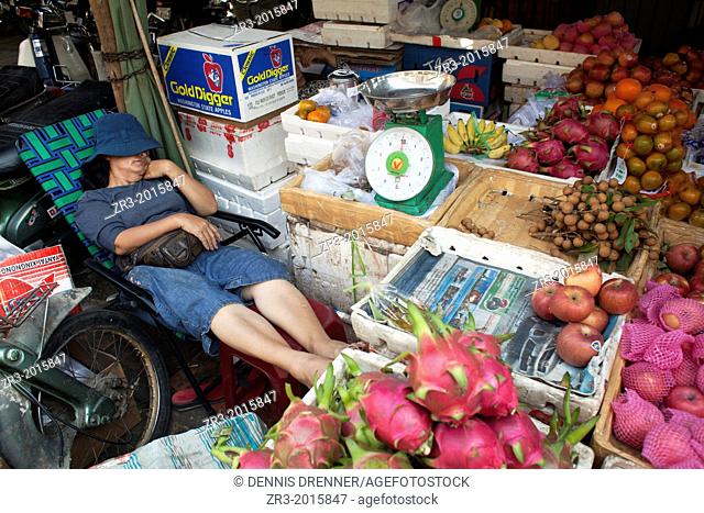 Sleeping vegetable vendor Phnom Penh, Cambodia