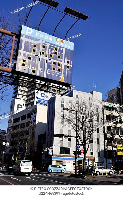 Fukuoka (Japan): avenue in Hakata, with a map of the parking lots