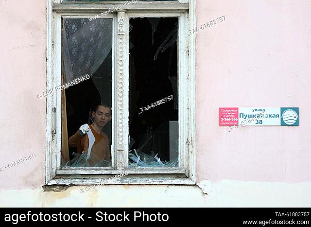 RUSSIA, ROSTOV-ON-DON - SEPTEMBER 7, 2023: A man is seen in a broken window near the scene of a drone fall. According to Rostov-on-Don Region Governor Vasily...
