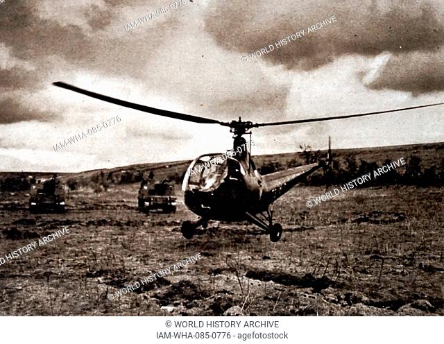 Photograph a Helicopter landing in a very small area. Dated 20th Century