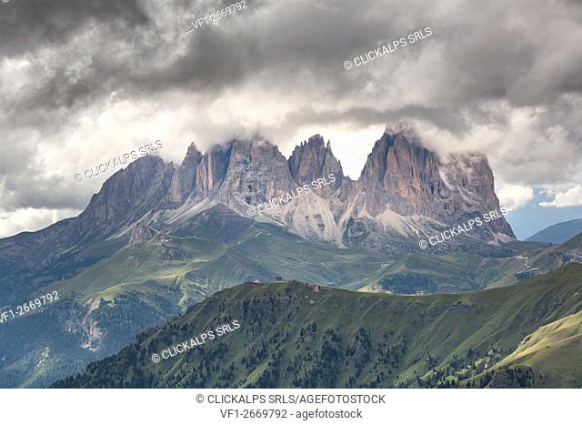 Europe, Italy, Trentino, Dolomites. Sassolungo in a day of clouds photographed from Marmolada