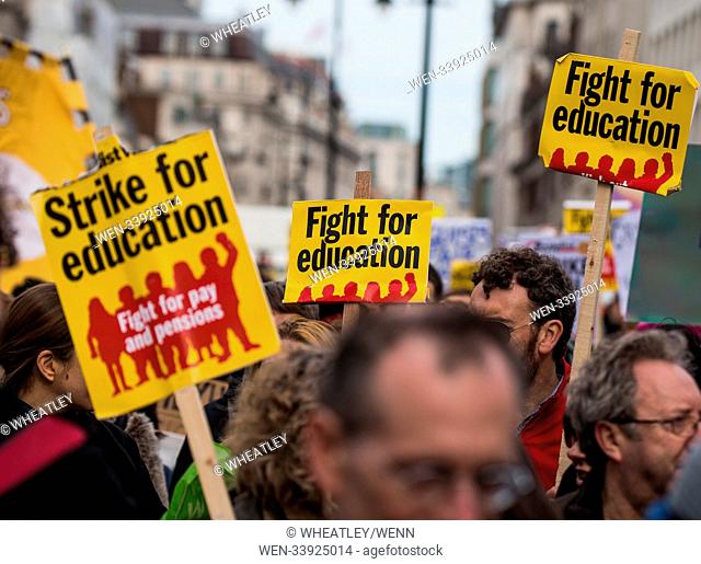 Striking University lecturers and students march through London after turning down an agreement reached by university union leaders and employers to end the...