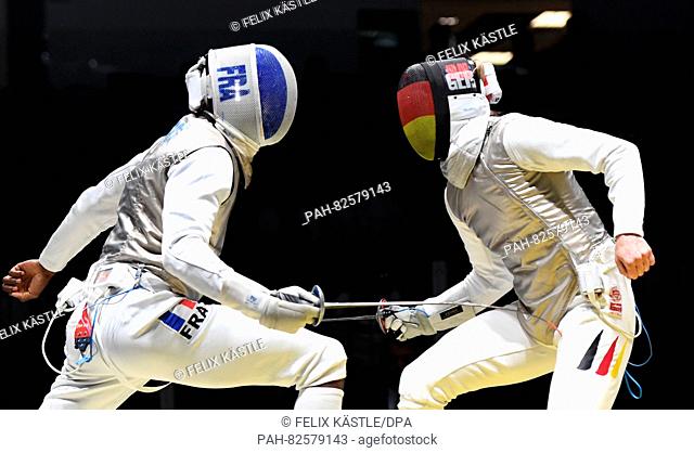 Peter Joppich (R) of Germany in action against Giorgio Avola of Italy in the men's Foil individual round of 16 event of the Rio 2016 Olympic Games at the...