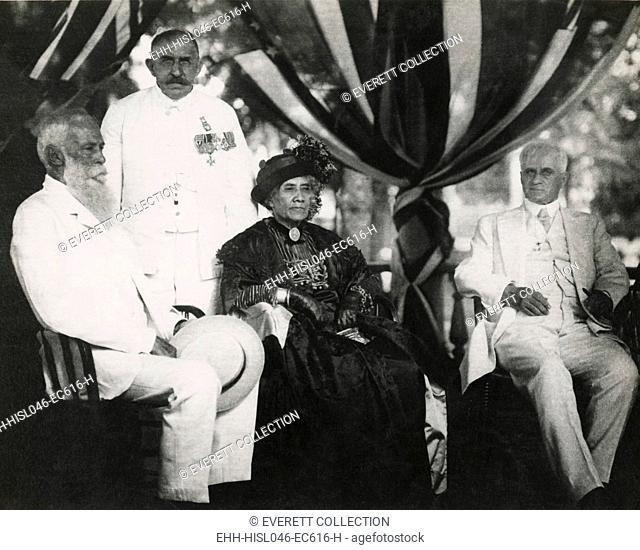 Ex-Queen Liliuokalani on her 70th birthday, seated with Sanford Dole (left) in 1914. At right is Lucius Eugene Pinkham, Territorial Governor