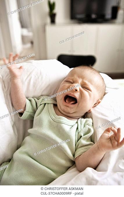 Infant crying in bed