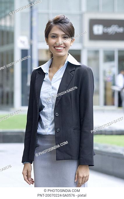 Portrait of a businesswoman smiling, Singapore