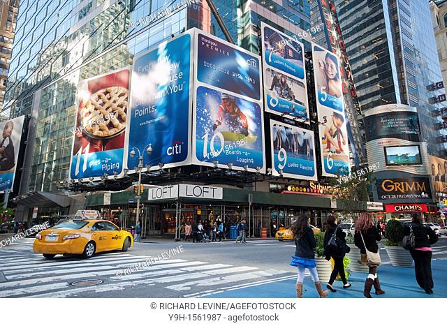 An advertisement for Citibank in Times Square in New York exuberantly promotes consumerism for the Christmas holiday