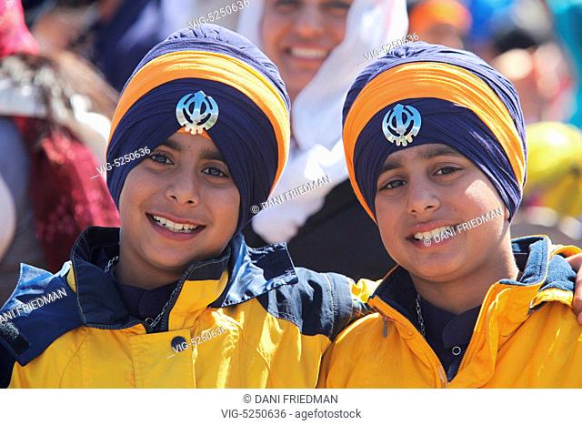 CANADA, MISSISSAUGA, 04.05.2014, Sikh brothers dressed in matching attire take part in the traditional Nagar Kirtan procession celebrating Vaisakhi and the...