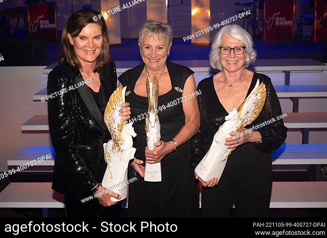 05 November 2022, Hessen, Frankfurt/Main: Former track and field athletes Ulrike Nasse-Meyfarth (l-r), Renate Stecher and Heide Ecker-Rosendahl are honored as...