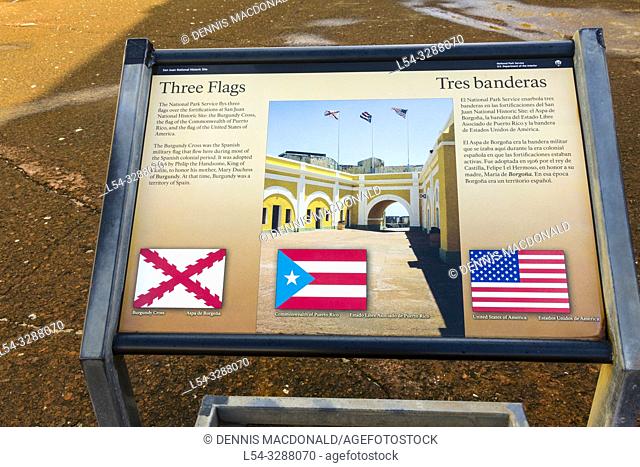Three flags US, Puerto Rico, and Burgandy Cross of Fort Castillo San Felipe del Morro at San Juan, Puerto Rico s capital and largest city