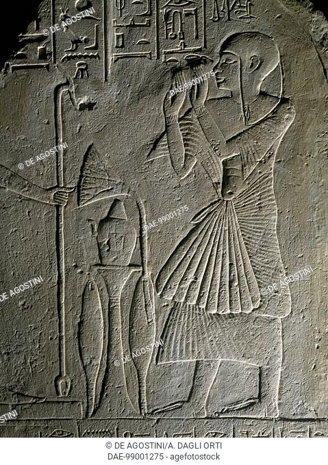 Stele of Khati, the scribe of the god's books, depicting the scribe in adoration of the God Ra. Egyptian civilisation, New Kingdom, Dynasty XVIII