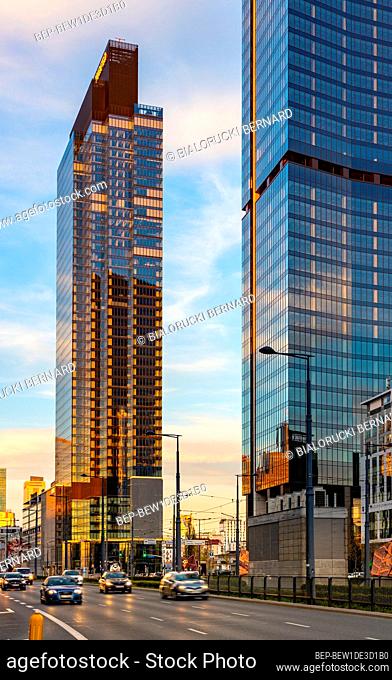 Warsaw, Poland - May 10, 2021: New business and financial district Wola with Warsaw Unit and Skyliner tower skyscrapers at Prosta street and Daszynskiego circle