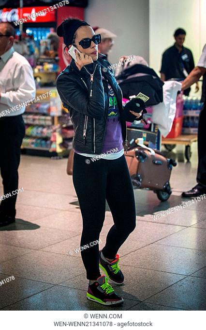 Lily Allen arrives at John F. Kennedy International Airport (JFK) New York with a trolley full of luggage. Featuring: Lily Allen Where: New York City, New York