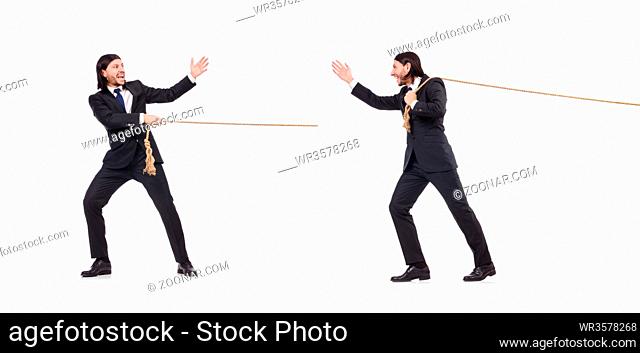 Young businessman pulling rope isolated on white