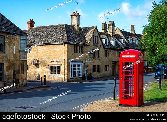 Red telephone box on High Street, Chipping Campden, Cotswolds, Gloucestershire, England, United Kingdom, Europe