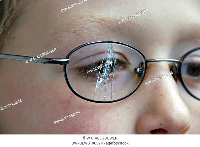 boy with broken glasses