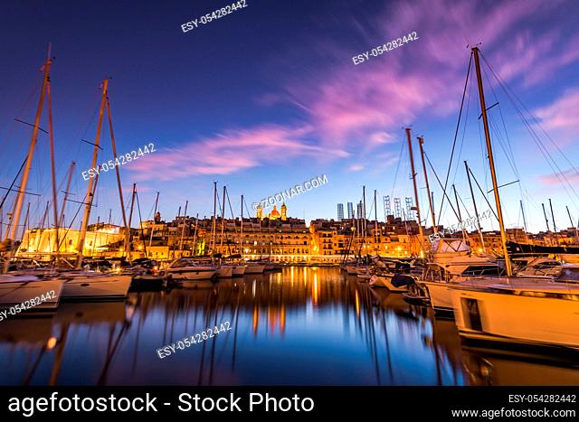 Beautiful sunset in Three Cities harbor, Malta