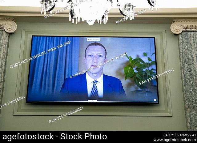 CEO of Facebook Mark Zuckerberg appears on a monitor as he testifies remotely during the Senate Commerce, Science, and Transportation Committee hearing 'Does...
