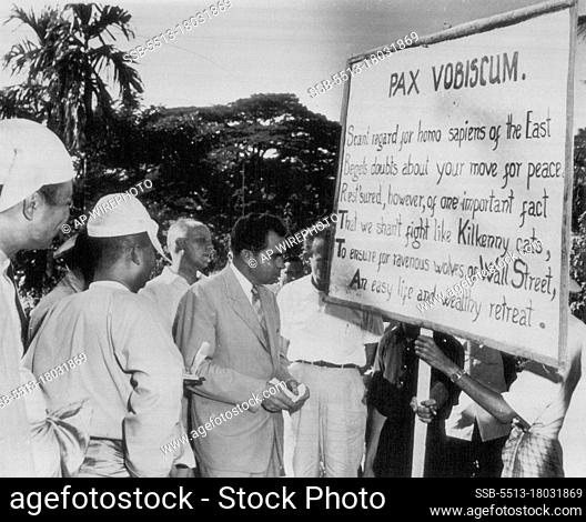 uNixon Talks With Anti- American Demonstrators -- Vice President Richard M. Nixon, center, looks at anti-American sign held by leftist demonstrators at Pegu
