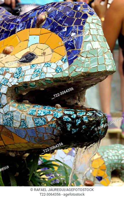 Barcelona, (Spain). Detail of the dragon or salamander made of brick slab covered with trencadís the Park Güell of the city of Barcelona
