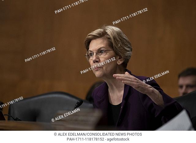 Senator Elizabeth Warren, Democrat of Massachusetts, asks the CFPB Director Kathy Kraninger a question as she testifies before the Senate Banking Committee on...