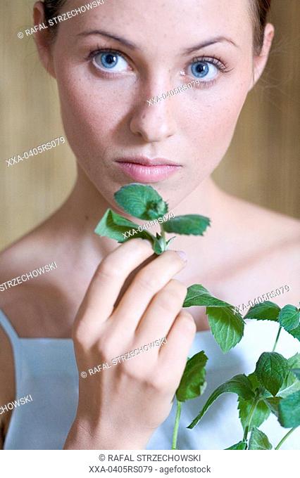 beauty woman with fresh herbs